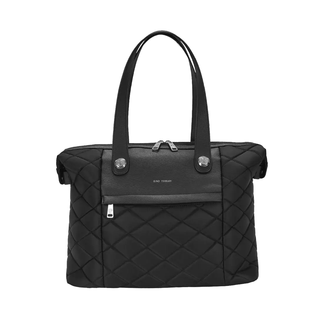 Black quilted handbag with silver hardware on a white background
