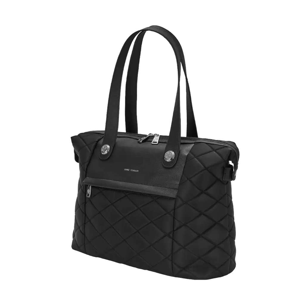 Black quilted handbag on a white background