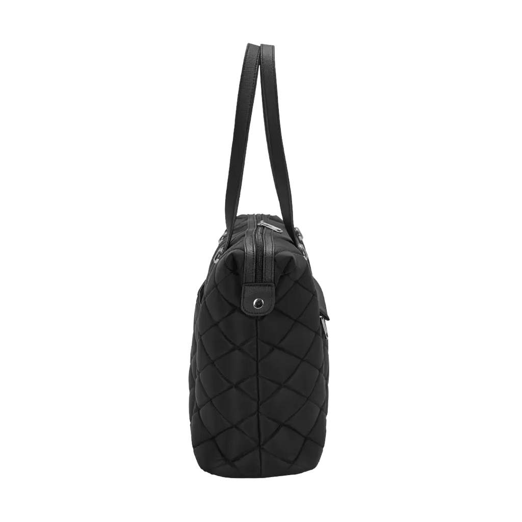 Black quilted handbag with a strap on a white background