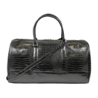 Leather-look textured bag with a pocket, handles and a silver zip with branding on it.