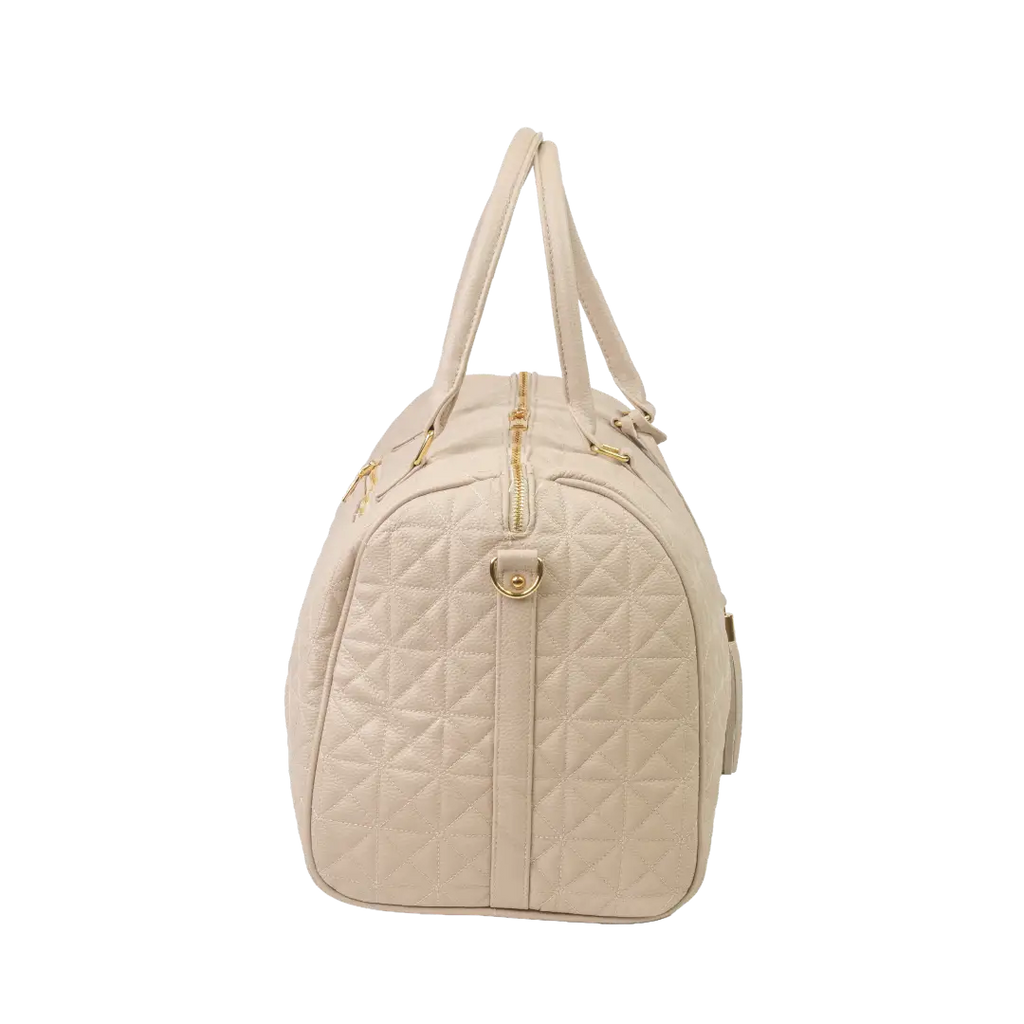 A close-up of a beige bag with patterned stitching, a gold zip and gold accents.