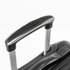 Close-up of a suitcase handle on a white background