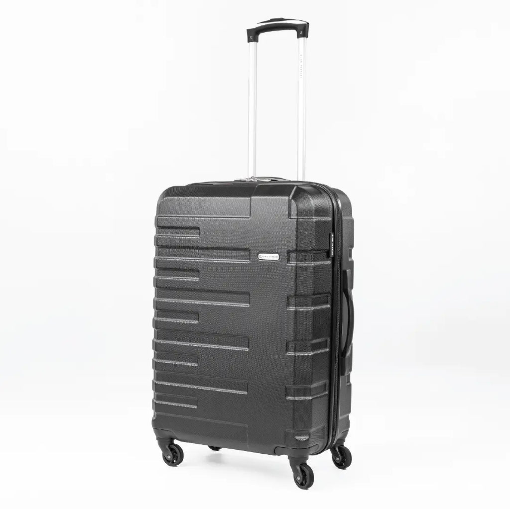 Black suitcase with a textured surface on a white background