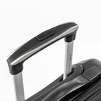 Close-up of a suitcase handle on a white background