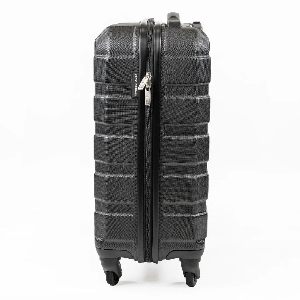 Side-view of a black cabin-sized suitcase, including the zips.