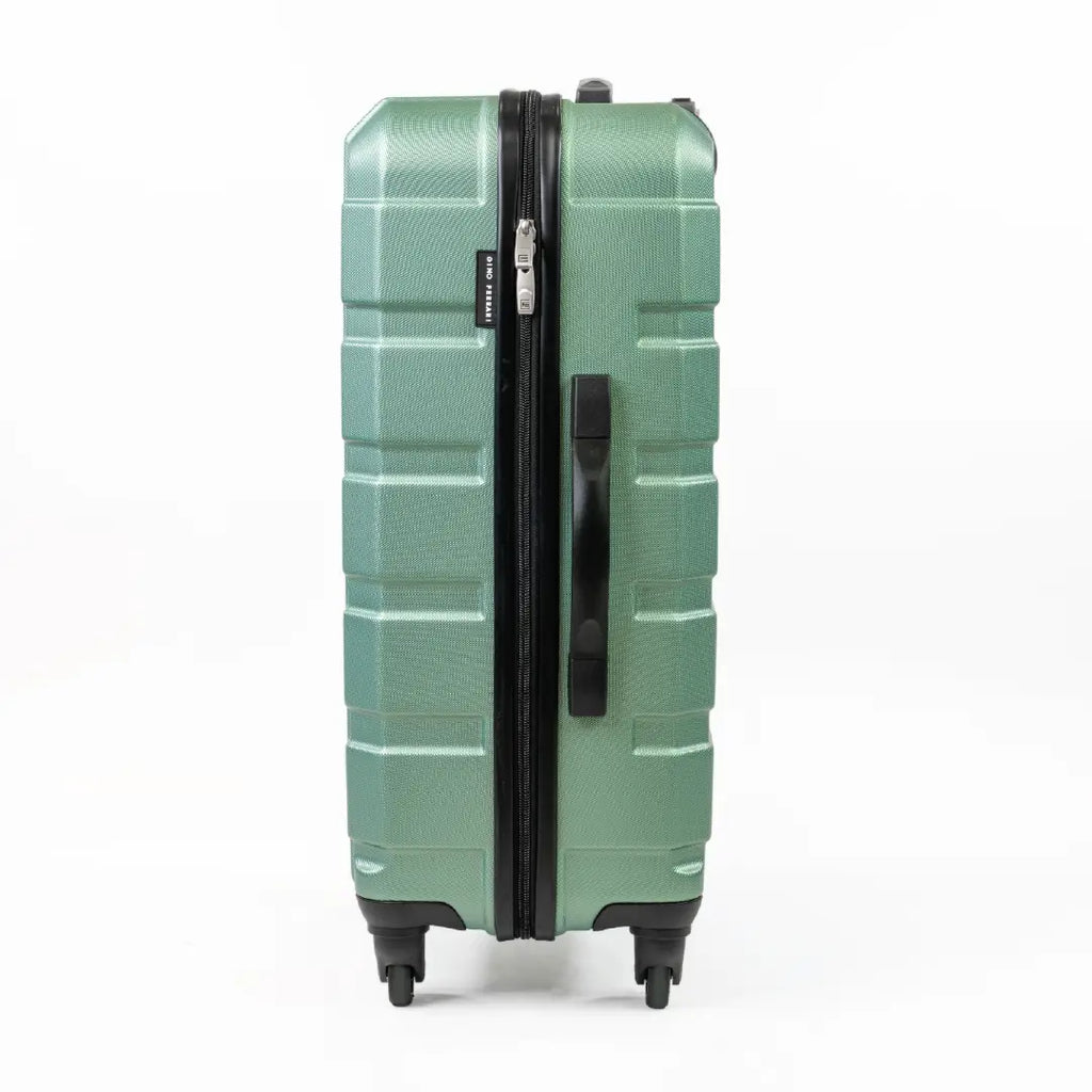 Green suitcase with a textured surface on a white background