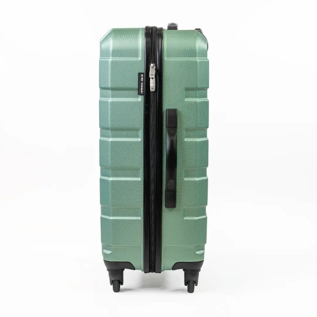 Green suitcase with a textured surface on a white background