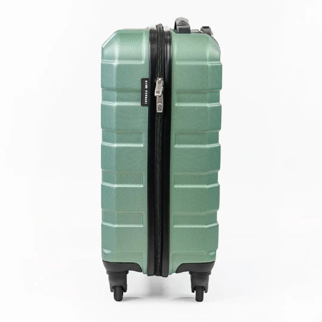 Green suitcase with a black zipper on a white background