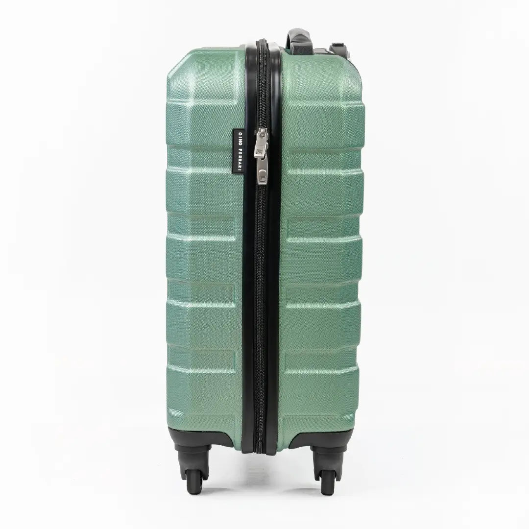 Green suitcase with a black zipper on a white background