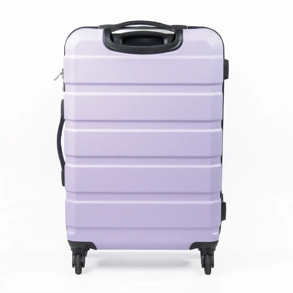Lavender suitcase with black handle and wheels on a white background
