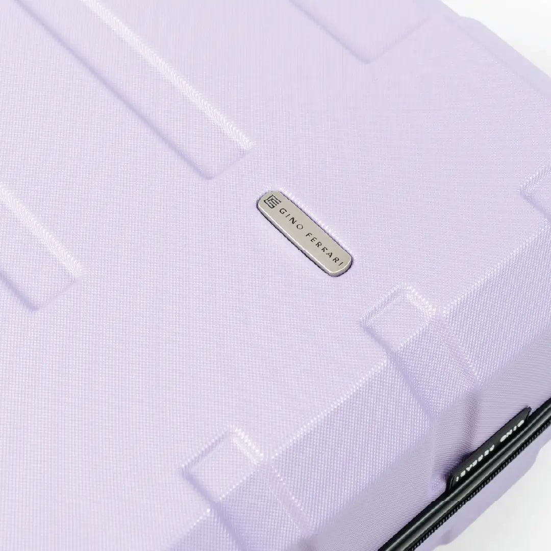 Close-up of a textured purple surface with a brand logo on a white background