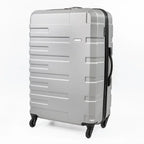 Silver suitcase with a black handle on a white background