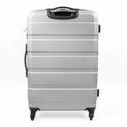Silver suitcase with black handle on a white background