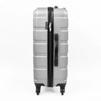 Gray suitcase with black handle and wheels on a white background