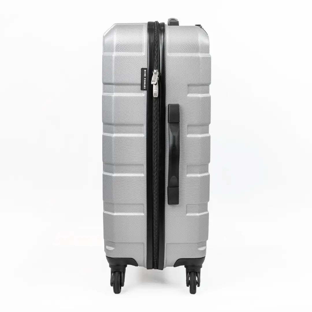 Gray suitcase with black handle and wheels on a white background