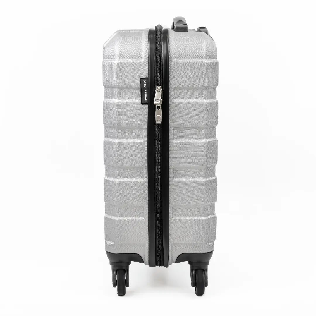 Side view of a silver suitcase with a black zipper.
