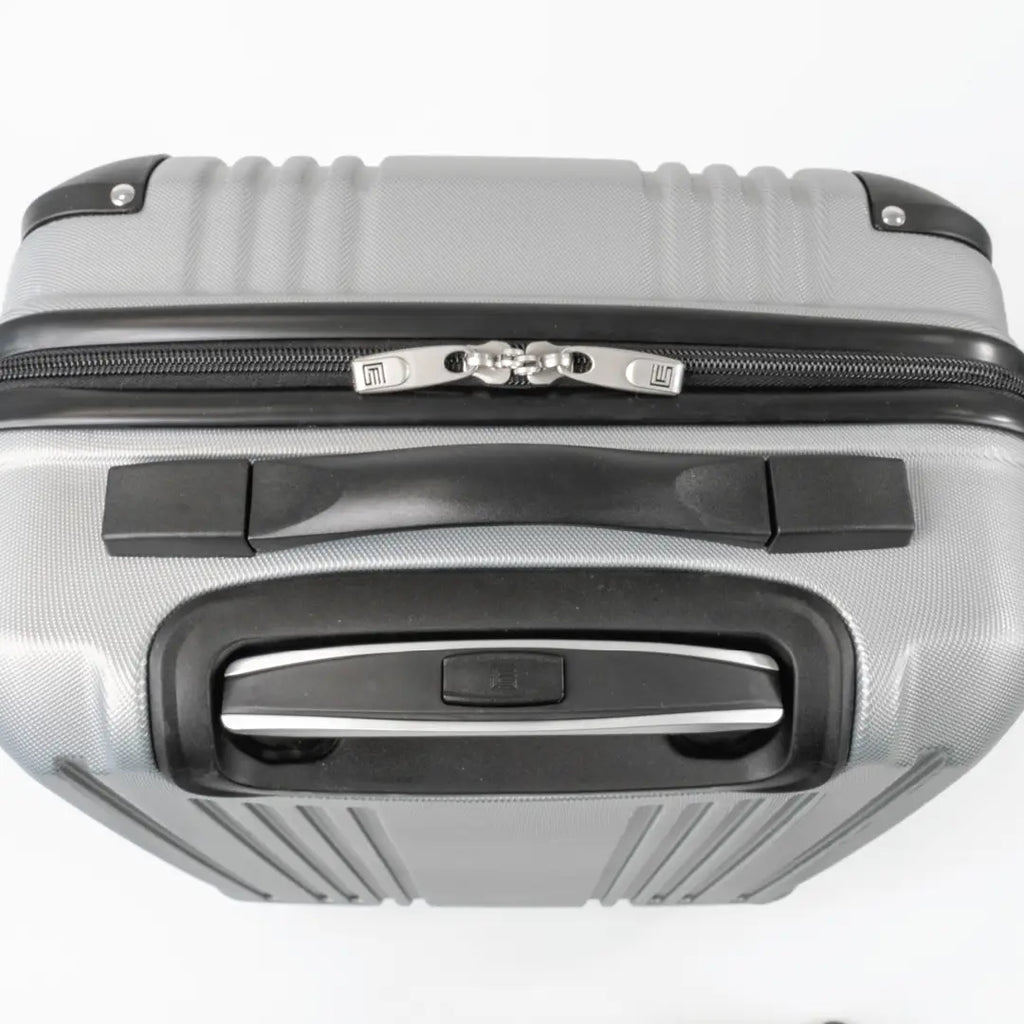 Silver suitcase with black handle and interlocking zip.