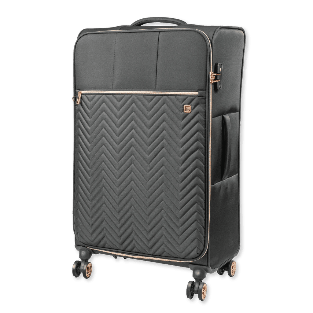 Gray suitcase with a chevron pattern on a white background
