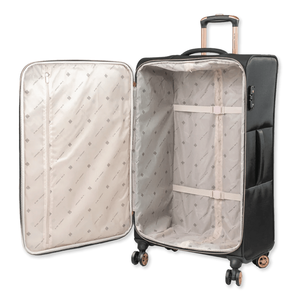 Open suitcase with quilted interior on a white background