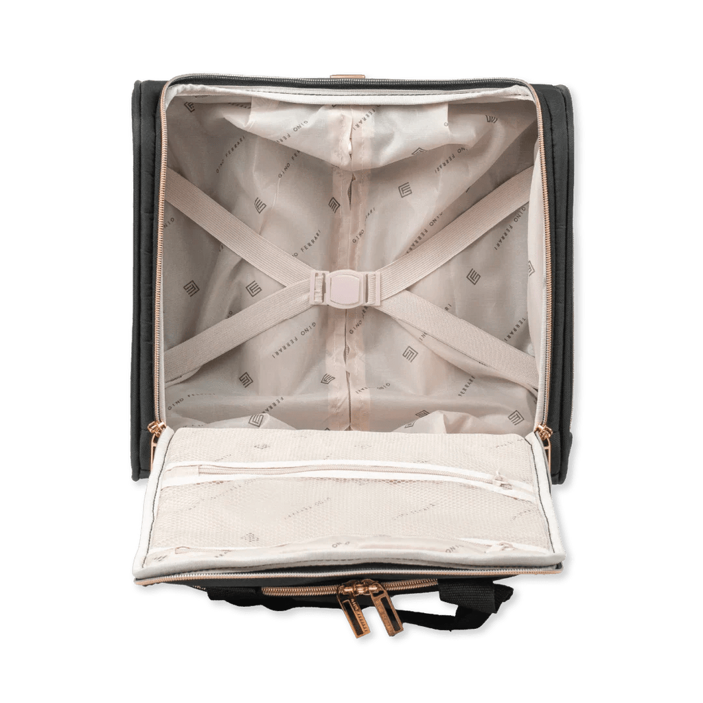 Open suitcase with interior lining and visible brand logo on a white background