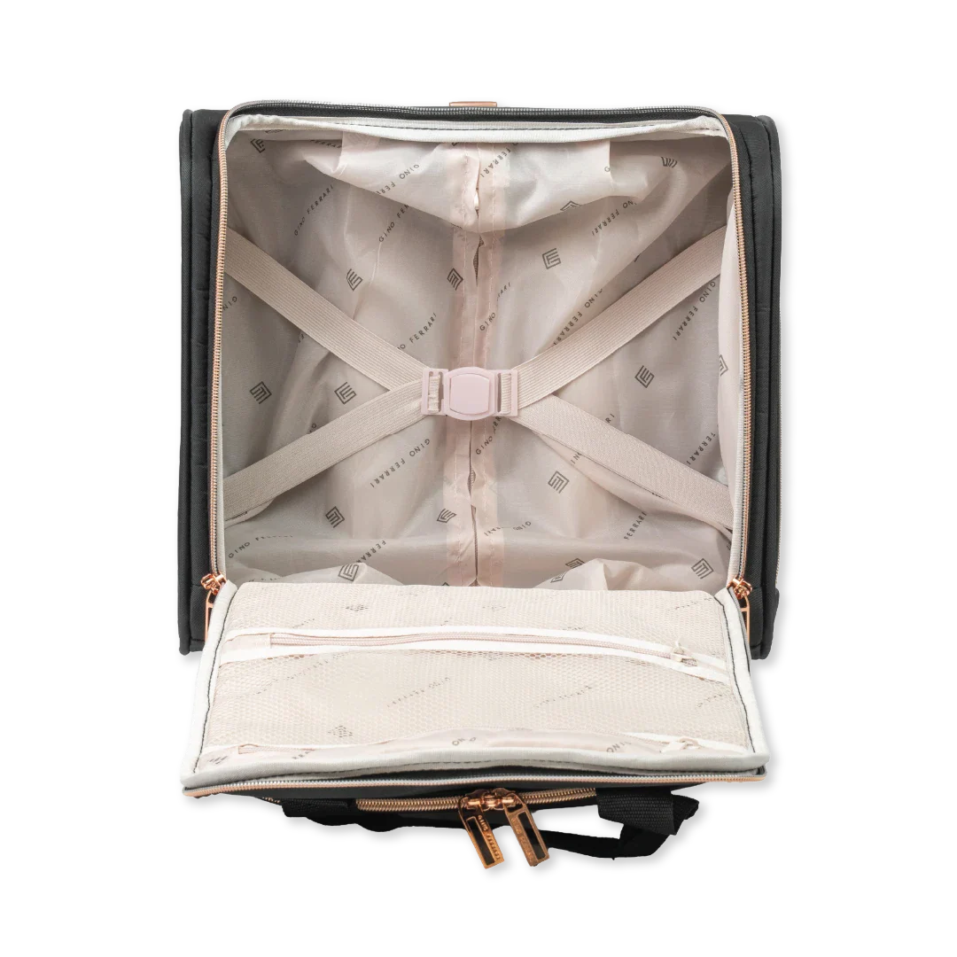 Open suitcase with interior lining and visible brand logo on a white background