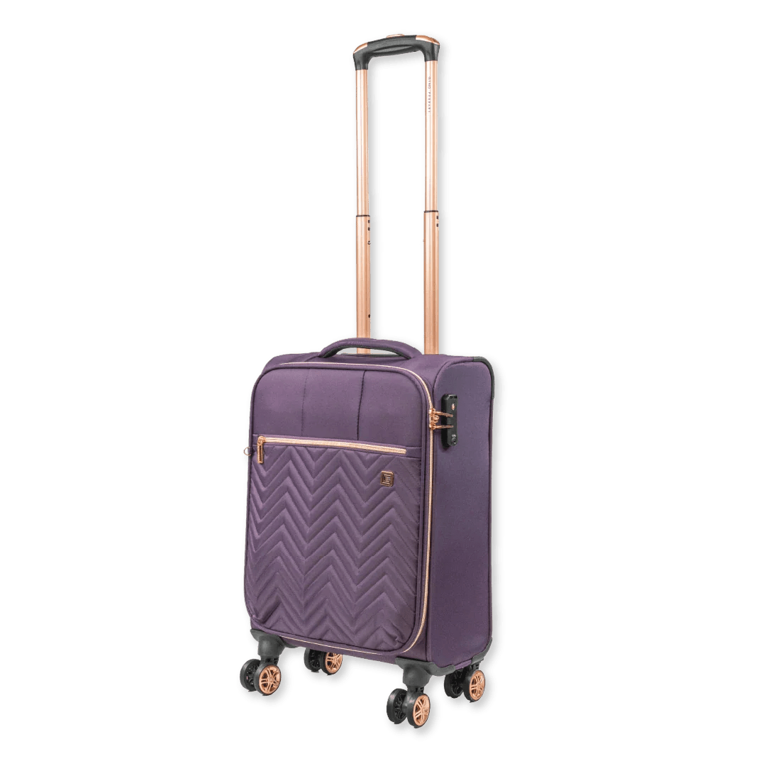 Purple suitcase with rose gold accents on a white background