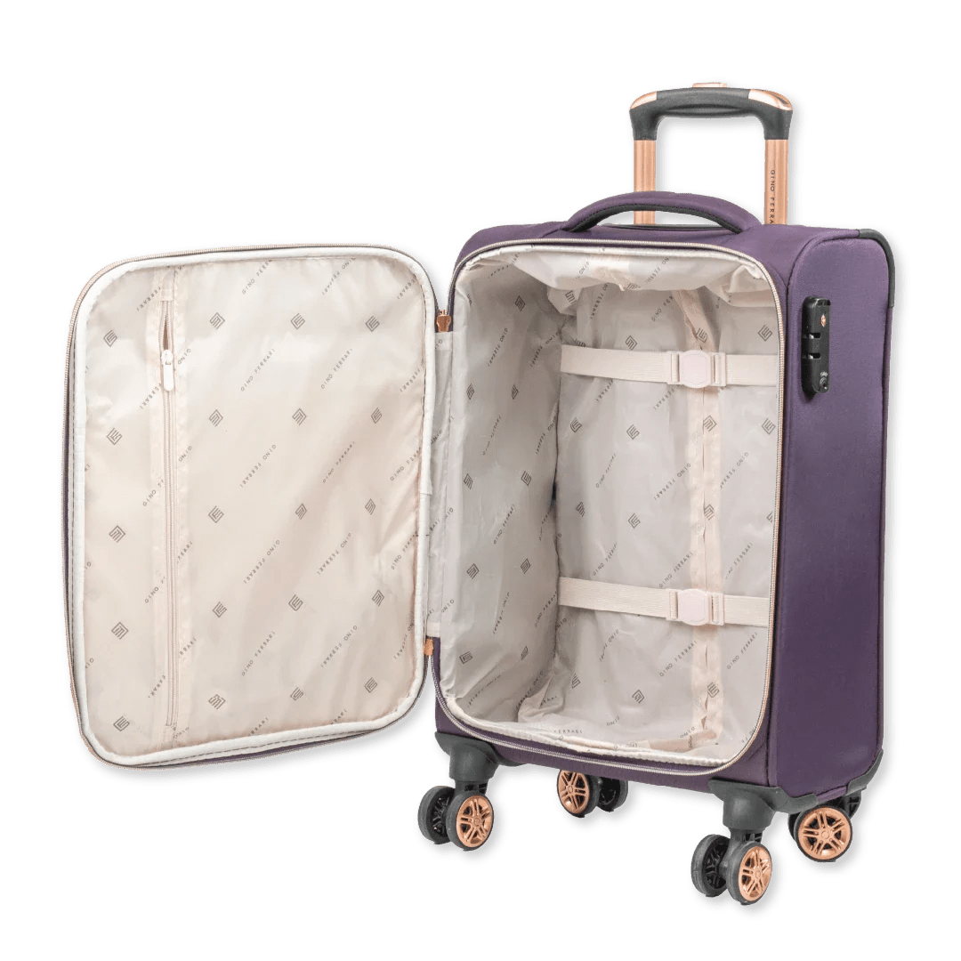 Purple suitcase with open lid showing quilted interior on a white background