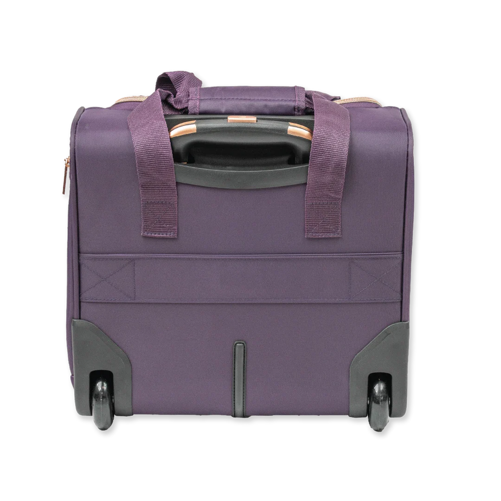 Purple suitcase with wheels and handles on a white background