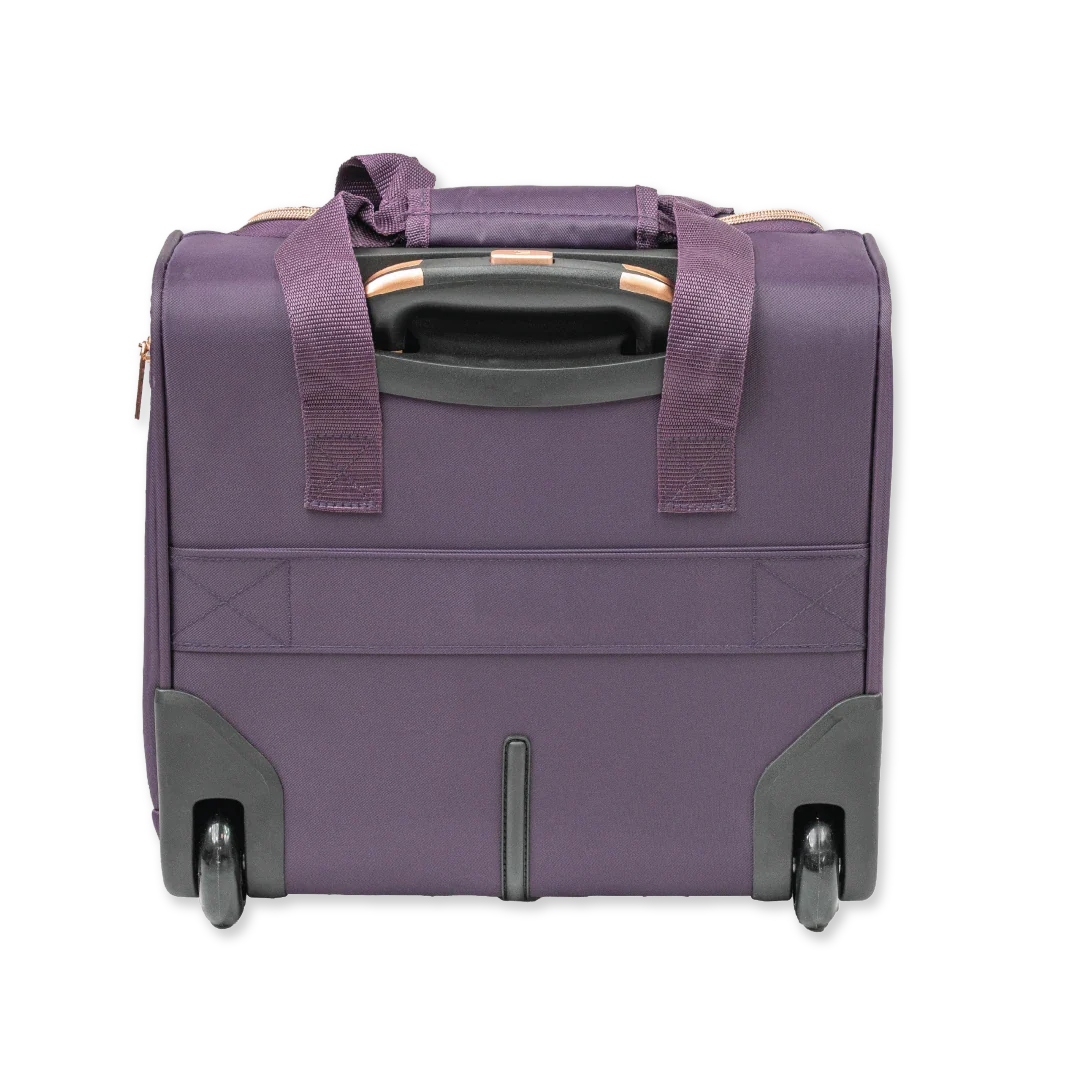 Purple suitcase with wheels and handles on a white background