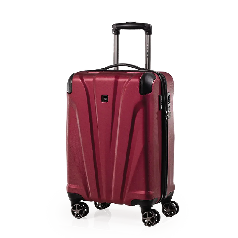 Red suitcase with wheels and handle on a white background