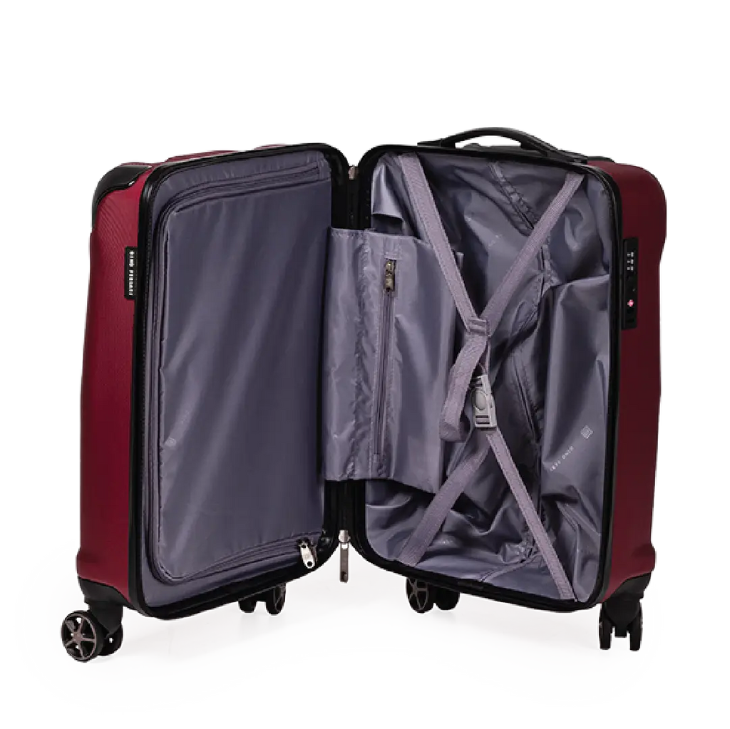 Red suitcase with open lid on a white background