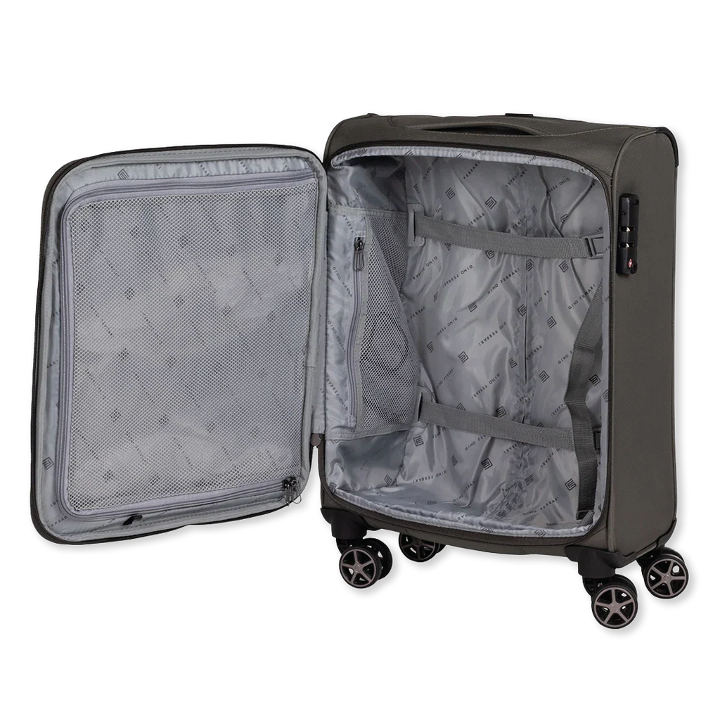 Green suitcase with open lid on a white background
