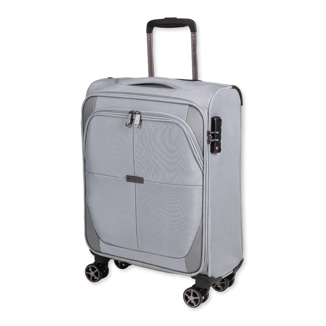Silver suitcase with wheels and a handle on a white background