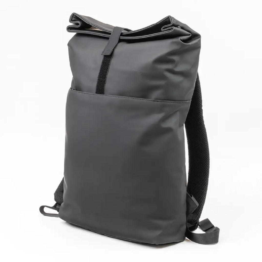 Black roll-top backpack on a white background