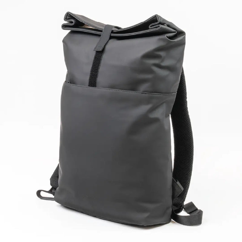 Black roll-top backpack on a white background