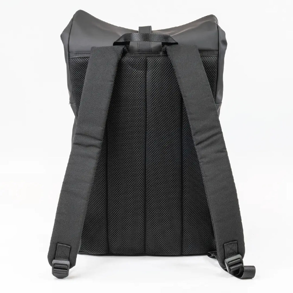Back view of a black backpack on a white background