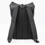 Back view of a black backpack on a white background