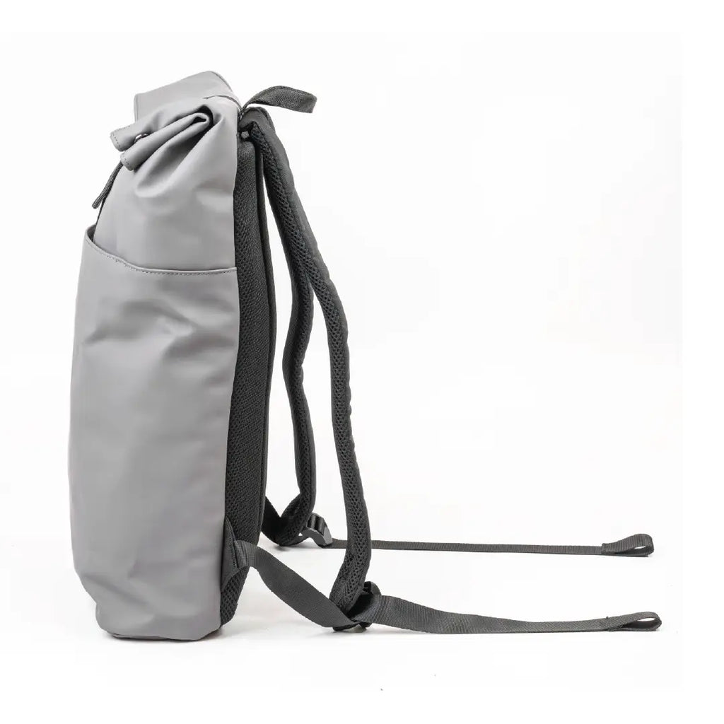 Gray backpack with black straps on a white background