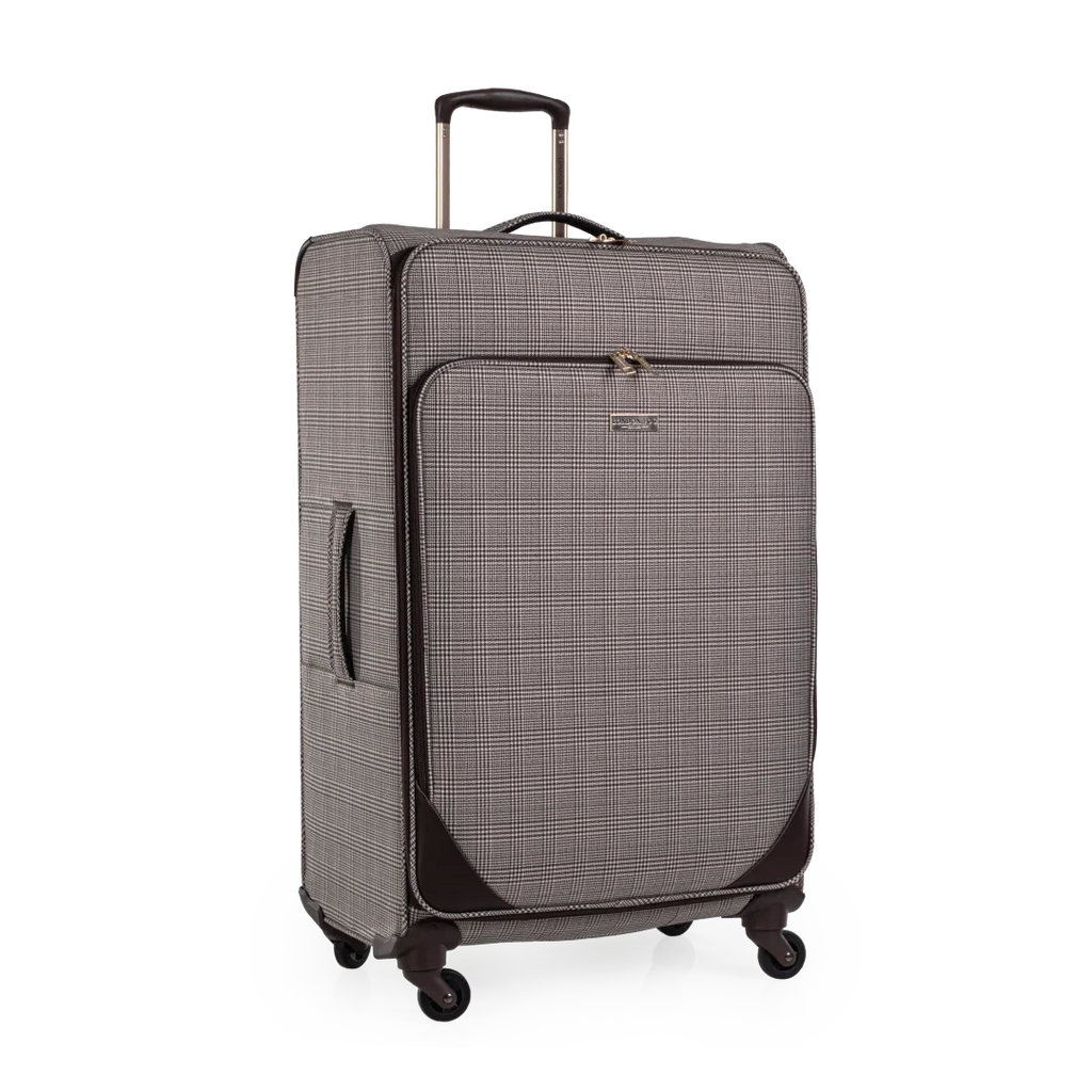 Checkered suitcase with wheels on a white background