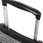 Close-up of a suitcase handle with 'London Fog' branding on a white background