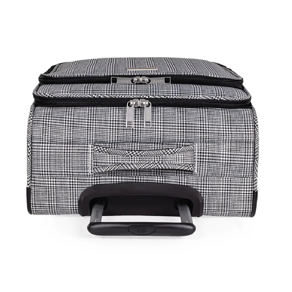 Black and white checkered suitcase with wheels on a white background
