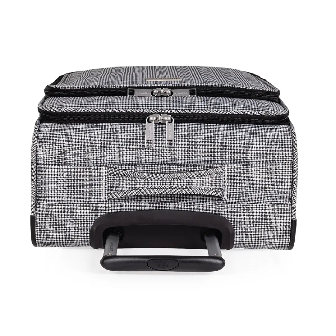 Black and white checkered suitcase with wheels on a white background