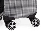 Close-up of a suitcase with wheels on a white background
