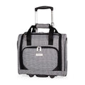 Plaid patterned rolling suitcase with black straps on a white background
